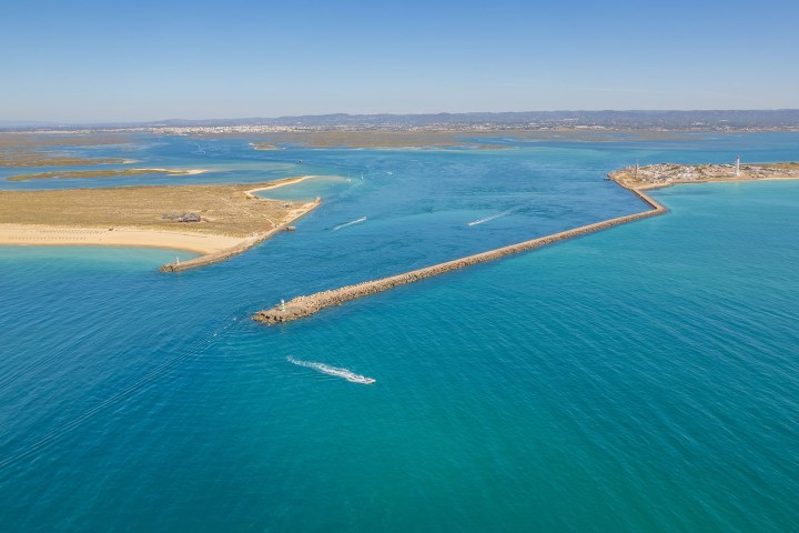a large body of water next to the ocean